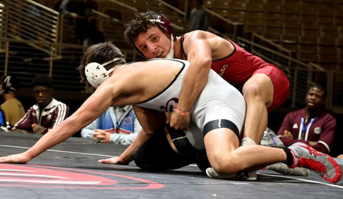 Gianni Maldonado of Lake Gibson wins the 157-pound title against Seth Larson from Flowery Branch, 3-0, on Saturday at the Knockout Christmas Classic at Silver Spurs Arena in Kissimmee.
